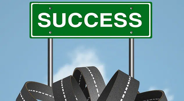 Green success road sign