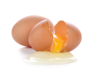 Two brown hen's eggs, one broken