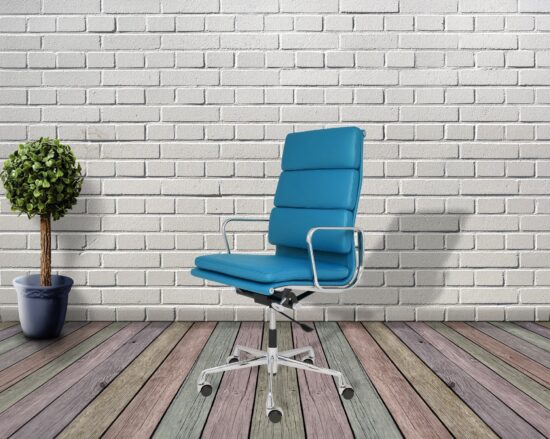 Bright blue modern leather chair in office setting